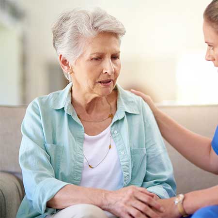 Woman learning about how hearing loss can affect her health