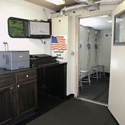 Mobile site hearing booth and interior
